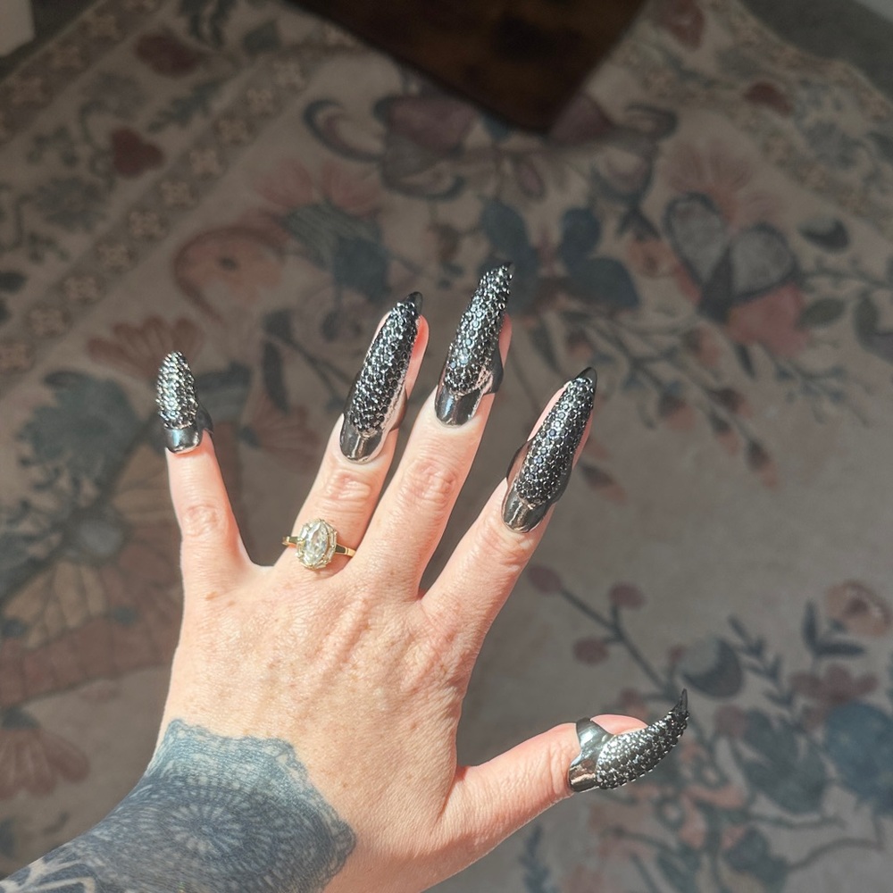 Elegant Black and Silver Claw Rings